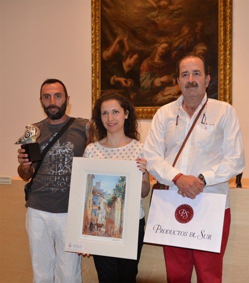 Ganadores (de izq a der. II Premio, I Premio y III Premio) del I Concurso Fotográfico Amigos de San Nicolás.